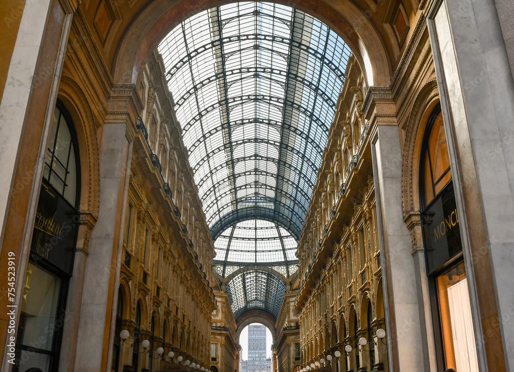 Low-angle view of Galleria Vittorio Emanuele II (1877), the Italy's oldest active shopping gallery in the city centre of Milan, Lombardy, Italy