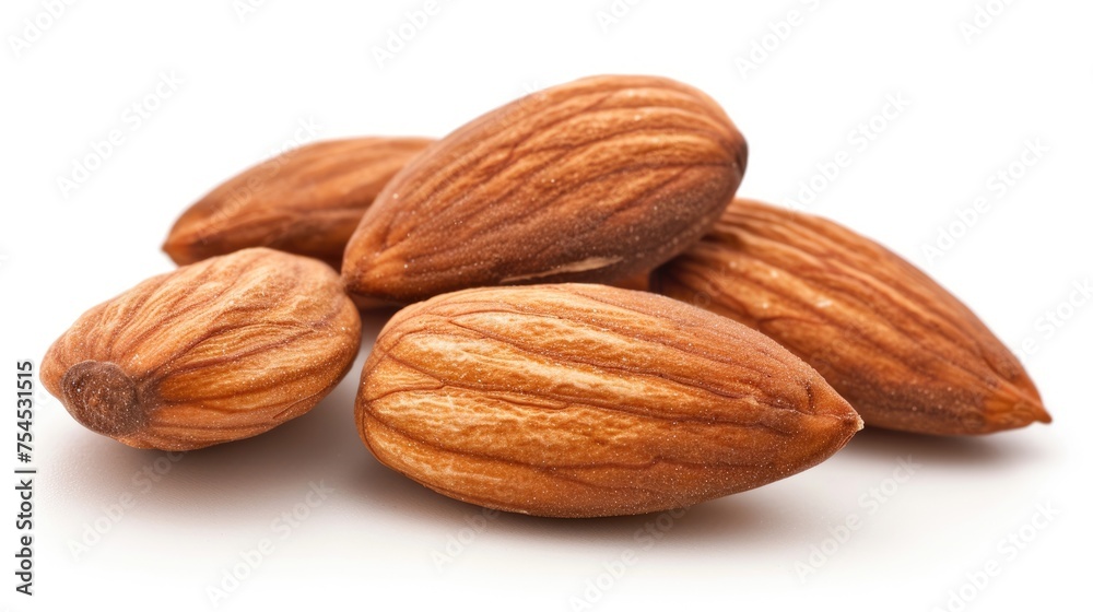 Closeup of Natural Almonds Group Isolated on White Background - Healthy Food Nut Concept Closeup of Natural Almonds Group Isolated on White Background - Healthy Food Nut Concept
