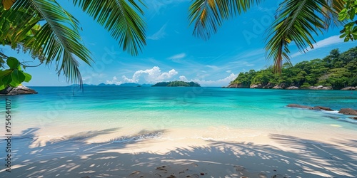 Tropical beach with white sand and azure water