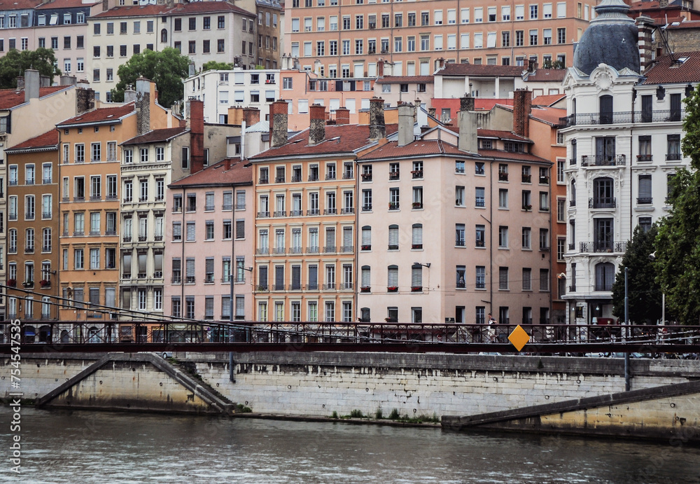 Old buildings on a river bank in Lyon city, France