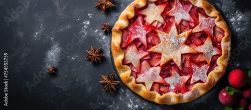 Delicious Homemade Strawberry Pie Garnished with Freshly Sliced Berries and Fragrant Star Anise
