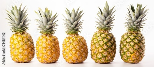 Vibrant Cluster of Delicious Tropical Pineapples - Exotic Fruit Arrangement