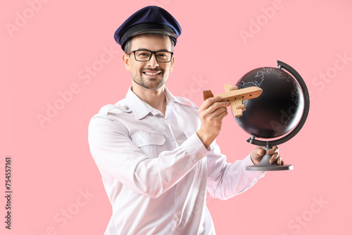 Portrait of male pilot with...