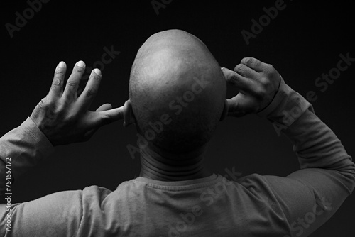 suffering from deafness and hearing loss on grey background with people stock image stock photo	