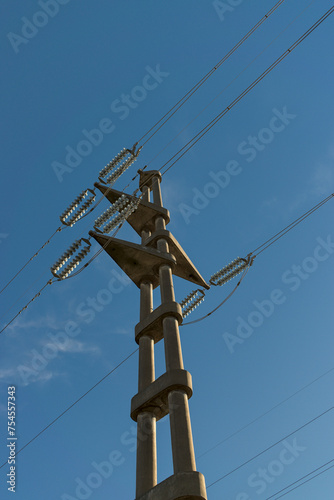electricity towers near a wind farm