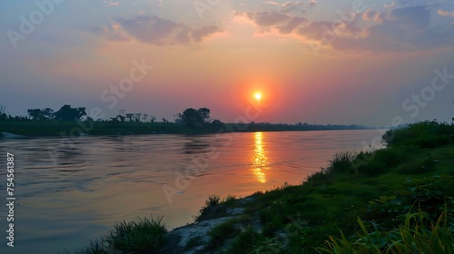 sun set at the bank of river 