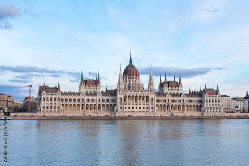 Beautiful sunset over Parliament Building and Danube River in Budapest, Hungary. 