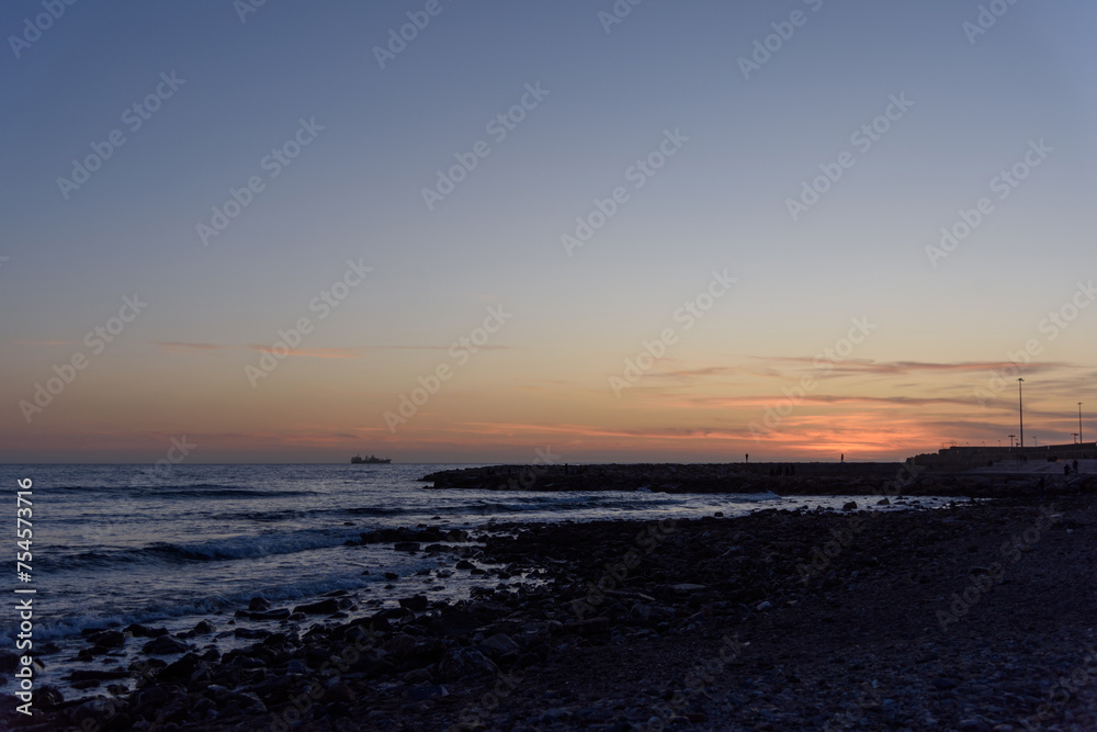Evening seascape, sunset over the sea horizon, panoramic view