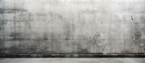 A black and white depiction of an empty room dominated by a grunge concrete wall. The absence of any furniture or objects creates a stark and desolate atmosphere.
