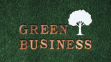 Arranged message in Green Business with tree icon as concept of eco corporate effort to commitment to CSR or corporate social responsible concept for environmentally sustainable. Gyre