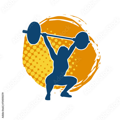 Silhouette of female athlete doing weight lifting sport. 