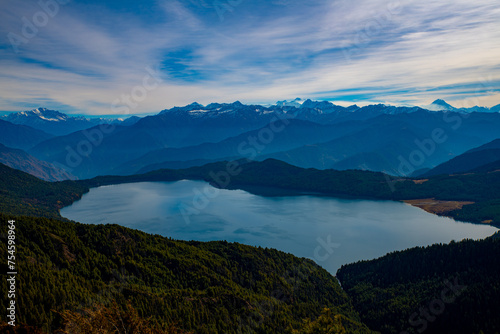 Fototapeta Naklejka Na Ścianę i Meble -  Sweeping View of Rara Lake from Murma Top, Nestled in the Himalayan Valley