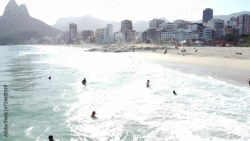 Brazil, Rio Di Janero, Copacabana Beach and Islands drone Ariel footage of spinning around the beach to ocean, to the sandy beach photo