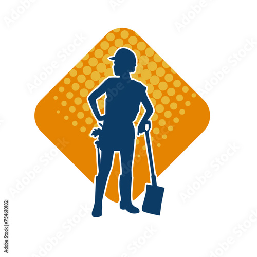 Silhouette of a female wearing worker costume in action pose with shovel tool.