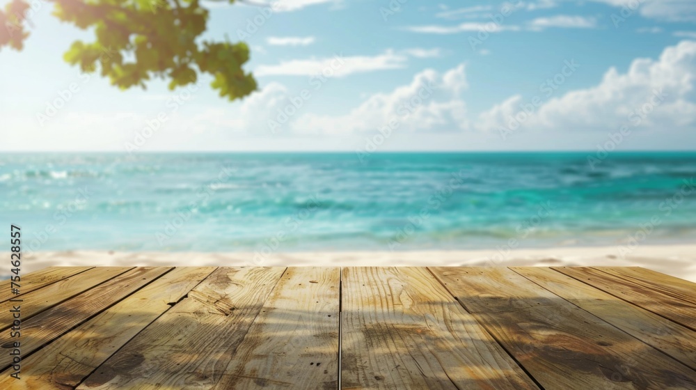 Fototapeta premium Wooden table top with copy space. Beach background
