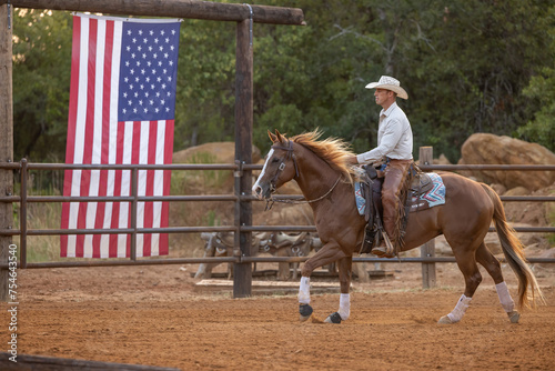 Cowboy Trainer riding a sorrel quarter horse