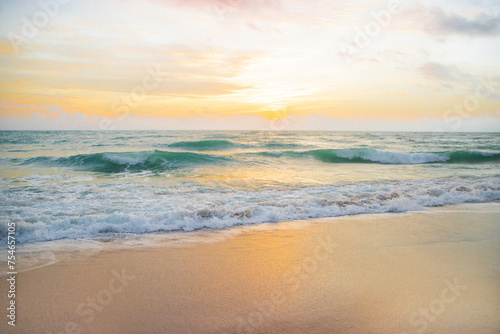 Sunrise over the ocean, water surface in slow motion during sunrise, static shot of nature background