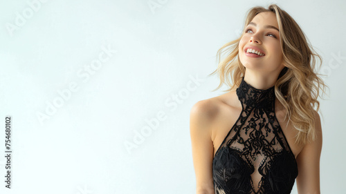 Blonde elegant woman in black halter neck dress isolated on gray Free Download Blonde elegant woman in black halter neck dress isolated on gray - GFXLoad