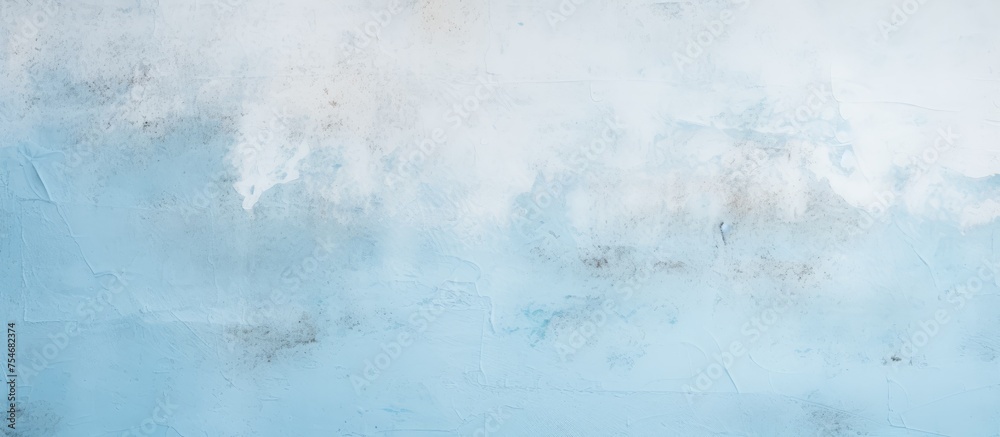 This painting showcases a textured blue and white wall with a mix of pastel blue and light concrete. The wall appears modern and vintage, with a soft, scratched sand grunge finish. The paintbrush