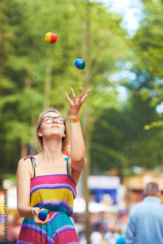 Obraz na plátně Camping, festival and juggle with woman in park for event, party or celebration in summer environment