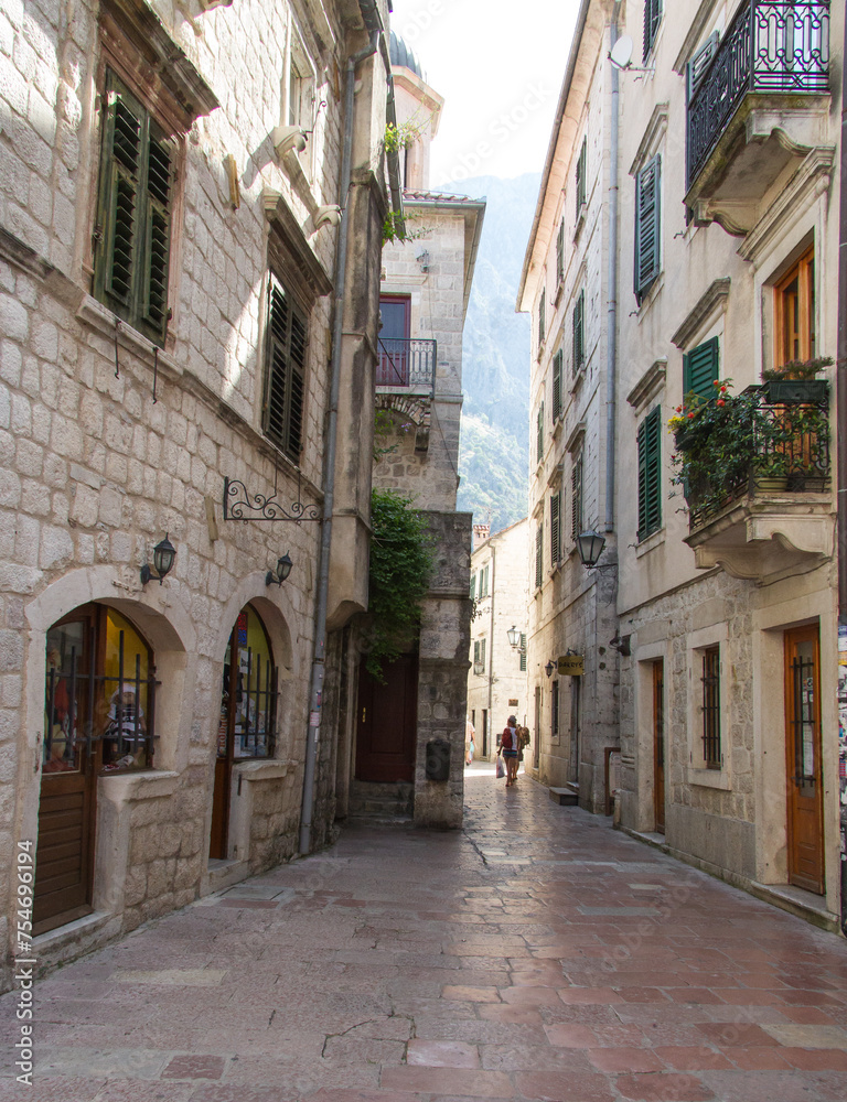 Narrow street in the old town of Kotor, Montenegro in summer