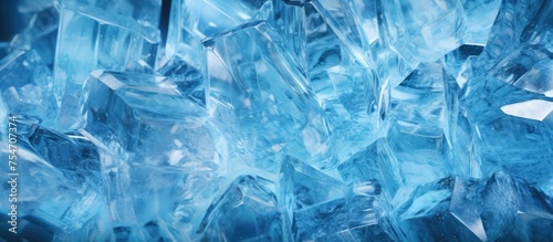 A detailed view of a cluster of ice crystals, each uniquely shaped and reflecting light, creating a mesmerizing pattern on a windows surface.