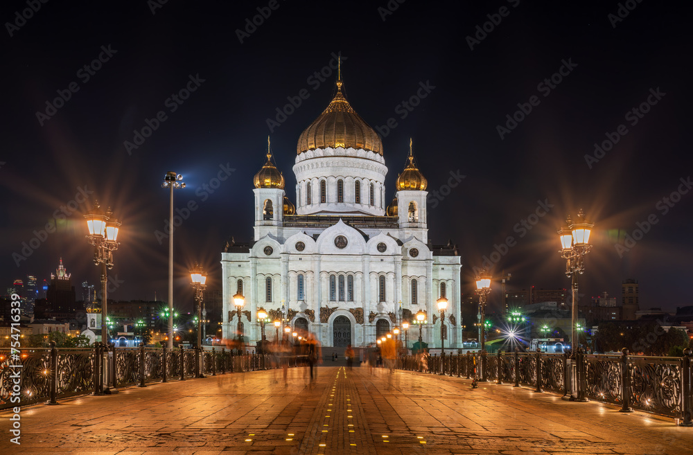Cathedral of Christ the Savior and Patriarshy bridge at night in Moscow, Russia