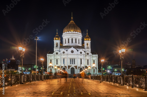 Cathedral of Christ the Savior and Patriarshy bridge at night in Moscow, Russia photo