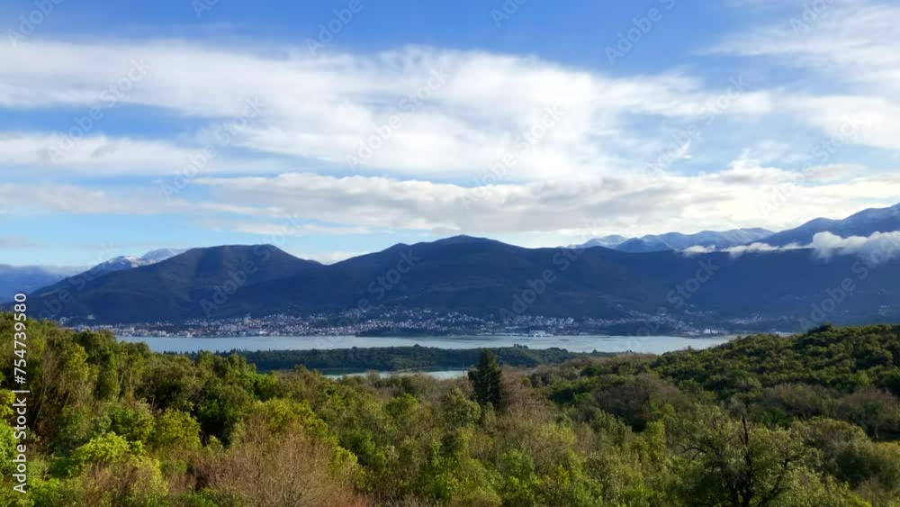 Beautiful mountain and ocean views. Calm seas. Bay of Kotor. Adriatic Sea. Porto Montenegro, Tivat, Montenegro. Europe. Beautiful mountain and ocean views. Calm seas. Bay of Kotor. Adriatic Sea. Porto Montenegro, Tivat, Montenegro. Europe.