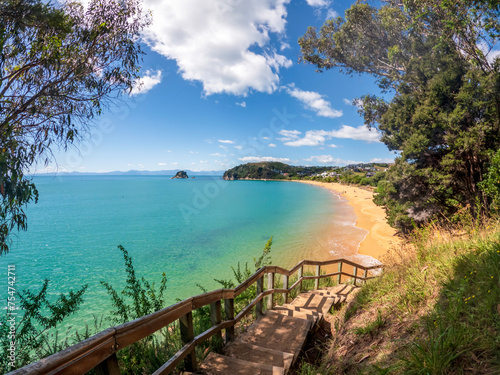 Fototapeta Naklejka Na Ścianę i Meble -  Little Kaiteriteri Beach: A breathtaking coastal landscape featuring stunning golden sands and crystal-clear blue waters, New Zealand