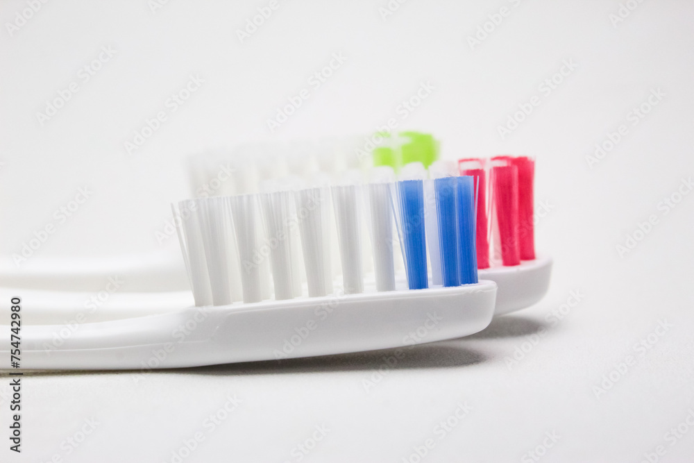 several toothbrushes isolated on a white background several toothbrushes isolated on a white background