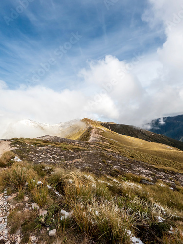 Kepler Track Alpine Landscape featuring Tussock-Covered Ridgelines in Fiordland National Park, New Zealand photo
