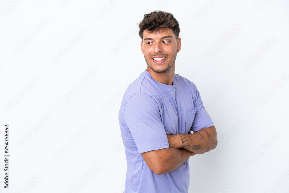 Young caucasian handsome man isolated on white background looking to the side and smiling Young caucasian handsome man isolated on white background looking to the side and smiling