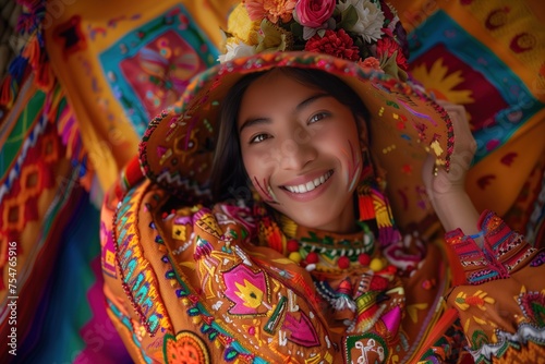 A woman is smiling and wearing a colorful hat and a colorful shirt