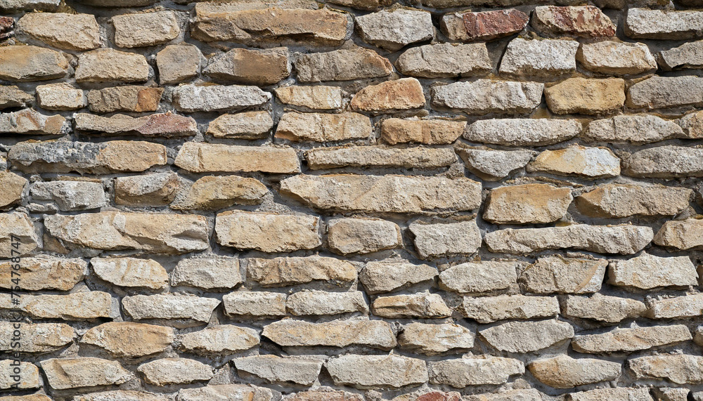 Fototapeta premium Masonry wall of stones with irregular pattern texture background