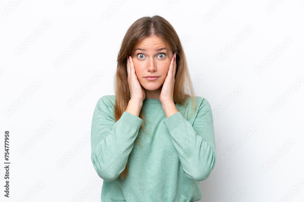 Young caucasian woman isolated on white background frustrated and covering ears Young caucasian woman isolated on white background frustrated and covering ears