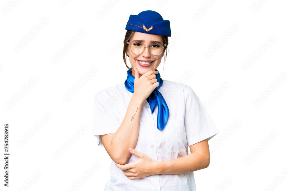 Airplane stewardess over isolated chroma key background with glasses and smiling Airplane stewardess over isolated chroma key background with glasses and smiling