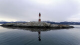 Famous lighthouse of Ushuaia City at Beagle Channel near Chile border. Patagonia Argentina. Called of End of the World Fin Del Mundo Lighthouse. Ushuaia Argentina Tierra del Fuego province. 