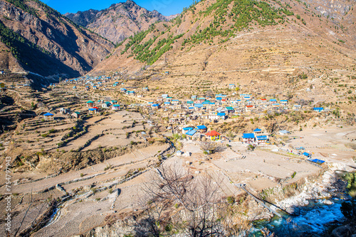 Expansive View of Chumchaur Jyulo Village Amidst Terraced Fields in Jumla, Karnali Province, Nepal photo