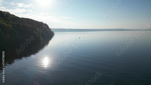 Wallpaper Mural On the horizon on the surface of the water is a fisherman's boat. View from a drone. Torontodigital.ca