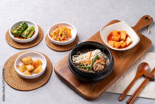 Korean food, budae jjigae, galbitang, earthen pot, bulgogi, pork belly, grilled, side dishes, kimchi, cucumbers, potatoes, vegetables