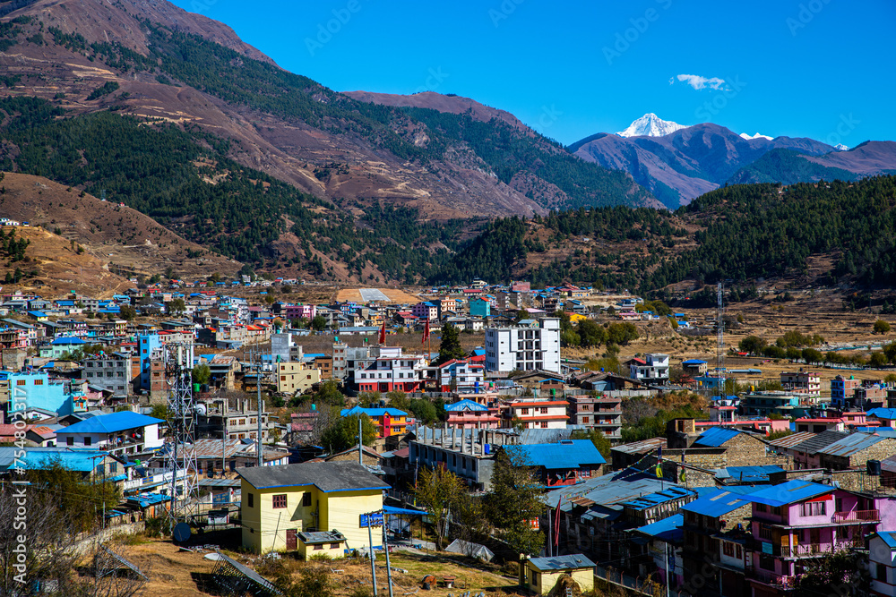 Vibrant Townscape of Jumla with the Snow-Capped Himalayas in the Distance, Nepal