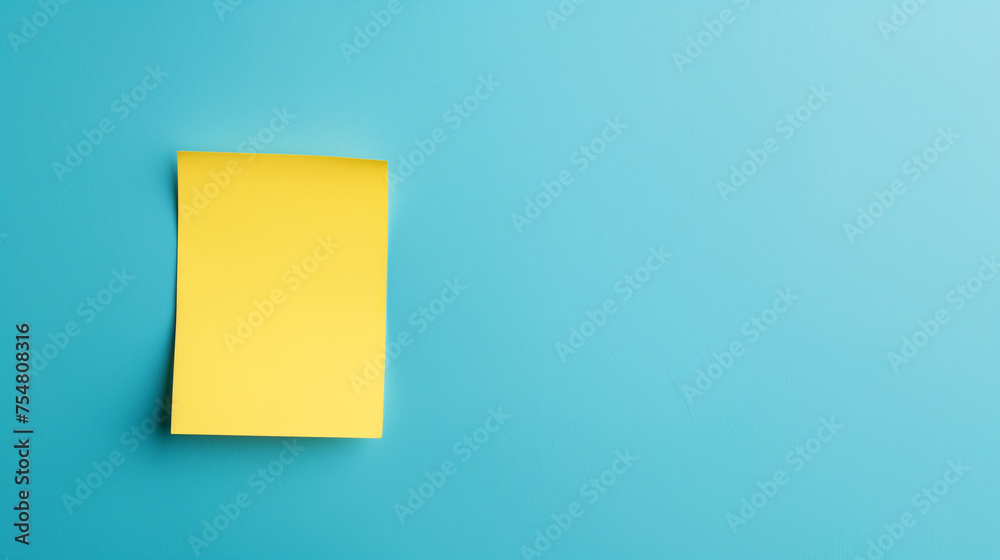 Yellow sticky note on blue backgroundl Yellow sticky note on blue backgroundl