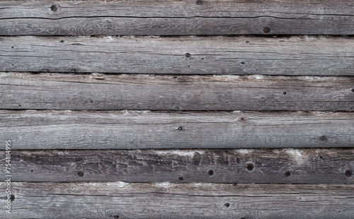 Texture of old weathered unpainted wooden wall photo