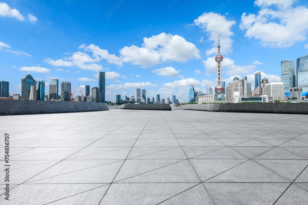 Empty square floor and city skyline with modern buildings scenery in Shanghai