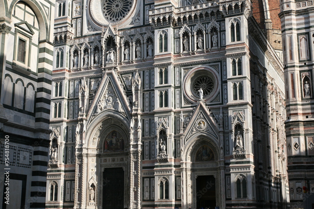 Facade of Florence Cathedral (Italian: Duomo di Firenze), built in Gothic style with white Carrara marble, green and pink marbles from Prato and Maremma, decorated with geometric patterns