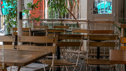 messy tables and chairs of a cafe