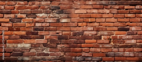 A wide panorama of an old red brick wall with a white sign mounted on it. The textured surface of the bricks contrasts with the clean, crisp appearance of the sign, creating a striking visual contrast