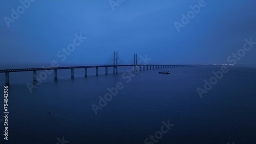 Wallpaper Mural Panoramic Aerial view of Oresund Bridge who is a combined motorway and railway, sea bridge between Denmark and Sweden (Copenhagen and Malmo) and ship - seascape of Baltic Sea, Europe from above Torontodigital.ca