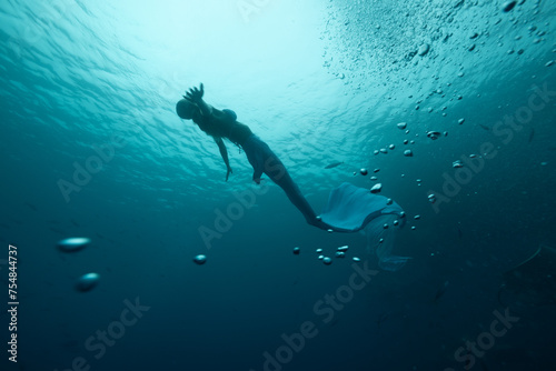 This photo is about scuba diving in the Maldives Islands. Starting from Male Airport  the photos range from underwater shots to mermaid shots by boat. This photo is about scuba diving in the Maldives
